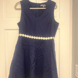 Navy sleeveless dress with white detailed waist